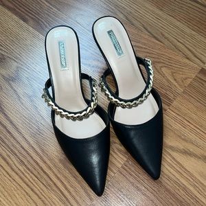 Primark black heels with gold details.